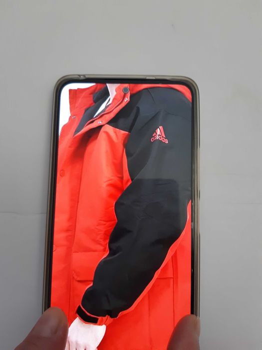 Продам новый пуховик Adidas