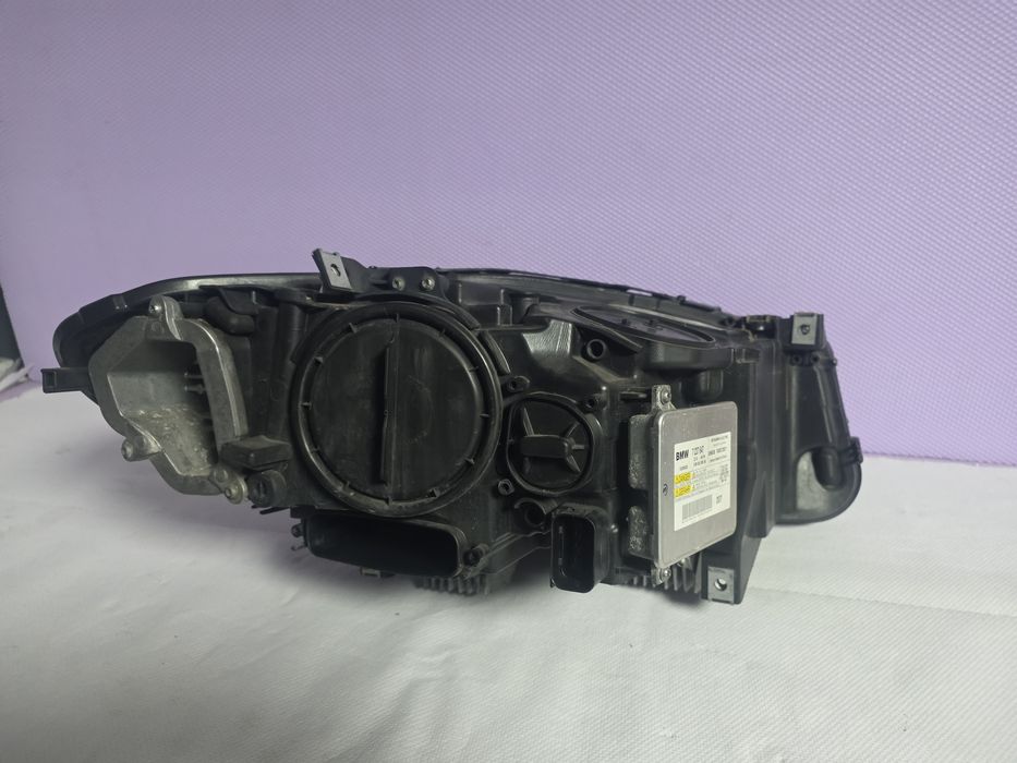 Far stanga BMW Seria 5 F10 F11 Bi-Xenon LED original HELLA 7203245