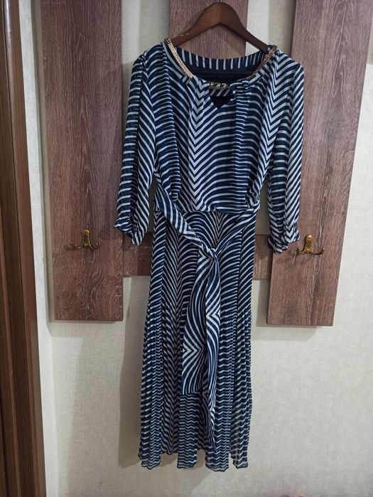 Продам б/у платья 46-52 размеры по