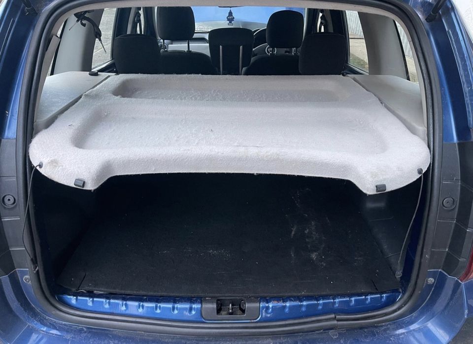 Polita portbagaj Dacia Duster