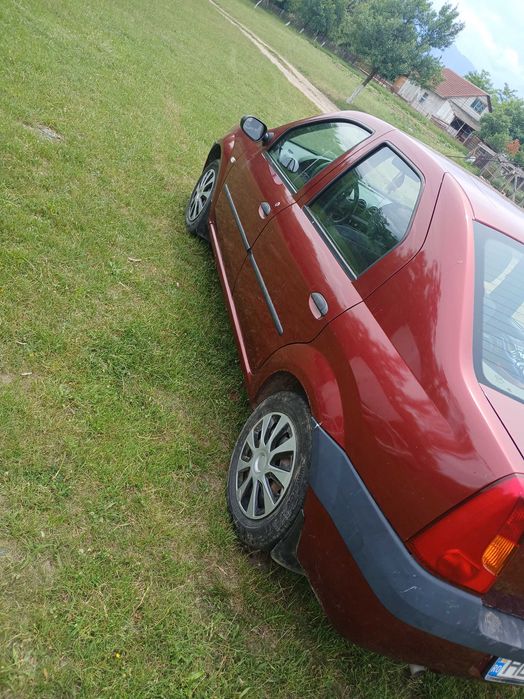 Vând sau schimb dacia logan