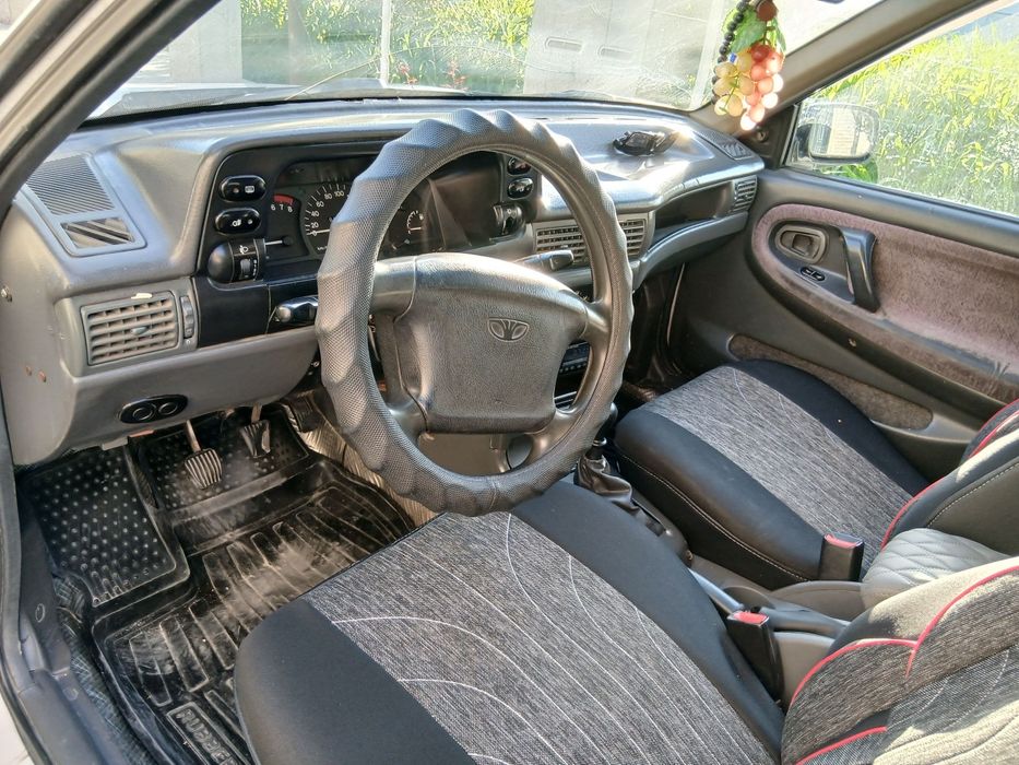 Нексия 1,2003-йил, оқ ранг, метан-бензин, краска радной, аъло холатда