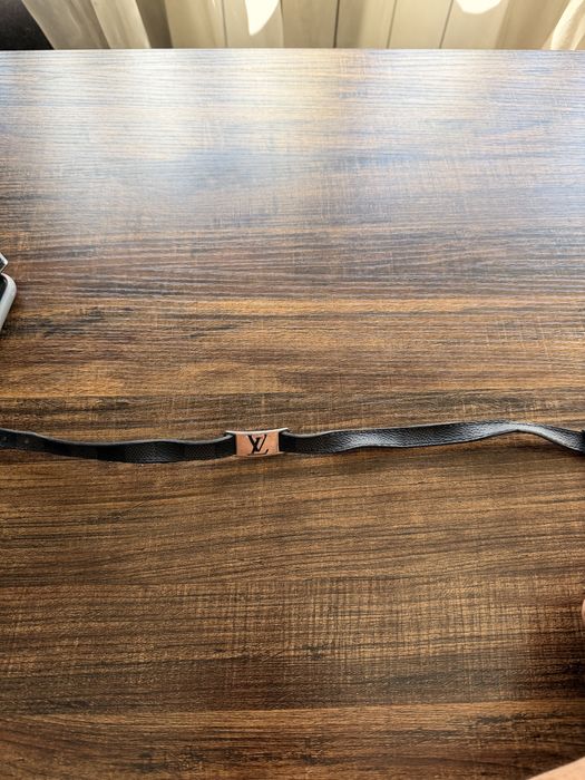 Louis Vuitton Sign It Double Wrap bracelet, black leather with silver-tone hardware.