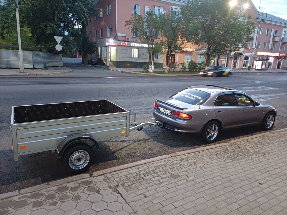 Продам мазду с прицепом.