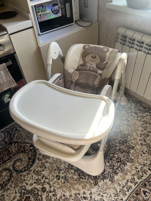 Продается детский стульчик фирма Karma Baby состояние хорошее.