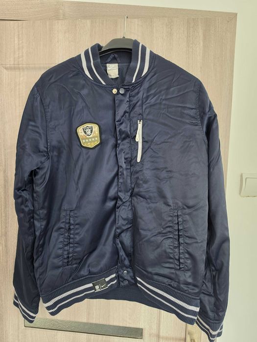 Las Vegas Raiders NFL Sport Classics Satin Jacket Black  New Era NFL Men's Sport Classics Satin American Football Jacket from your Las Vegas Raiders.
