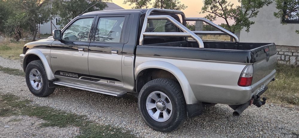 Mitsubishi L 200 climatronic 4x4 cuplaj la mare la mic Diferitial blocabil la buton