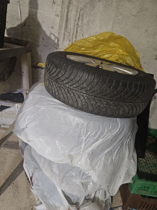 Set 4 anvelope all-season Goodyear + jante VW R15