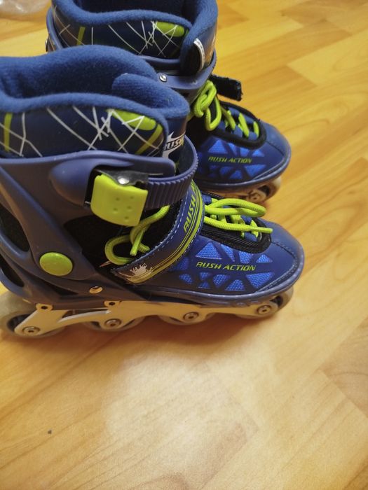 Роликовые коньки