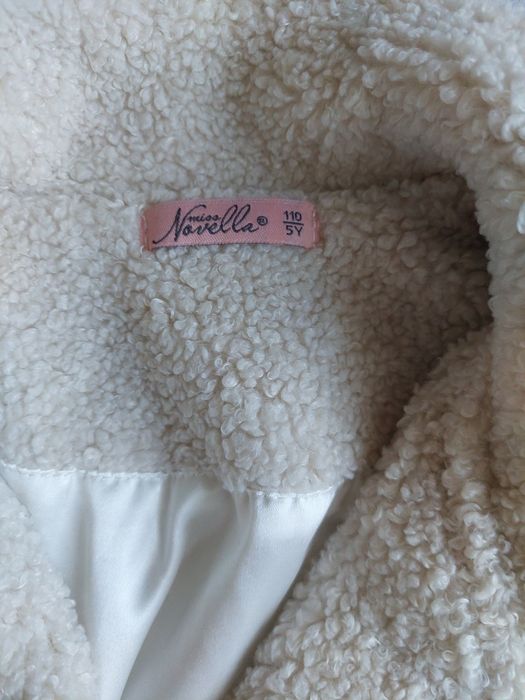 Курточки на девочку