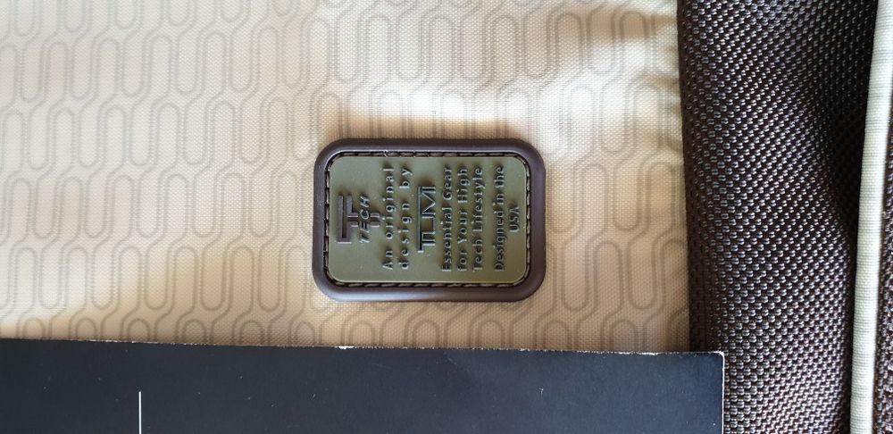 Tumi, borseta lux ,unisex, condiție impecabilă
