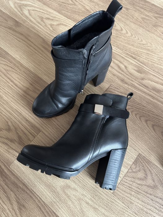 Зимние сапоги на каблуках