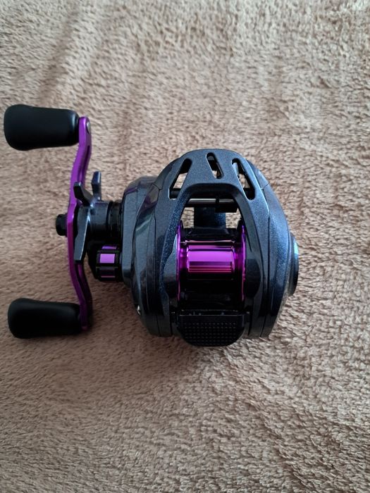 Mulinetă Baitcaster Low Profile – stare foarte bună, perfect funcționa