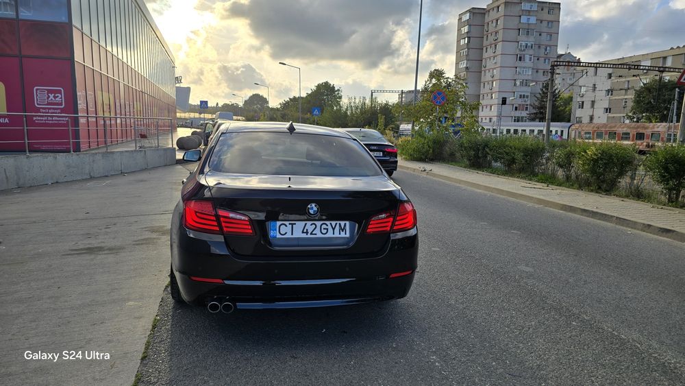 BMW 5 Series 2011 — imagine 28