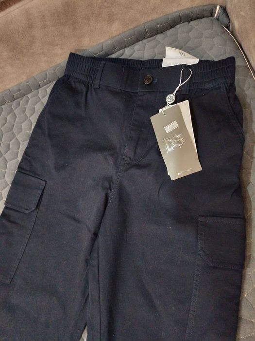 Продам новые брюки размер 152