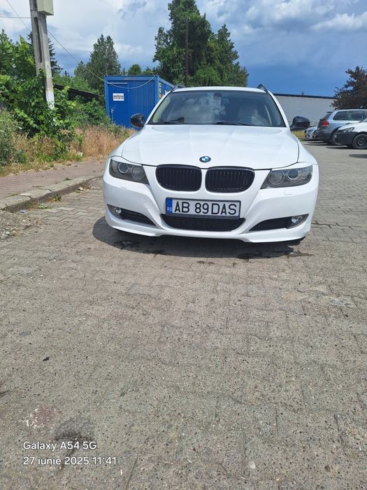 vând BMW e91 x drive