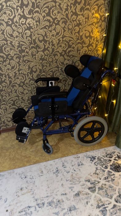 Инвалидная коляска для детей с ДЦП
