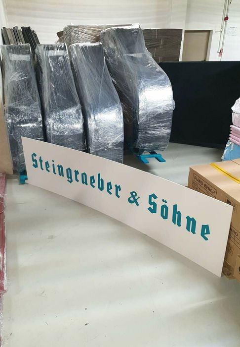 Професионален транспорт на пиана и рояли.