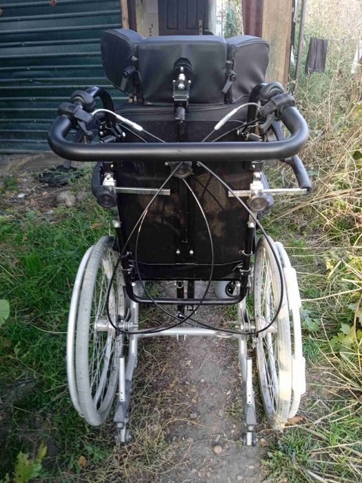 Инвалидная коляска.