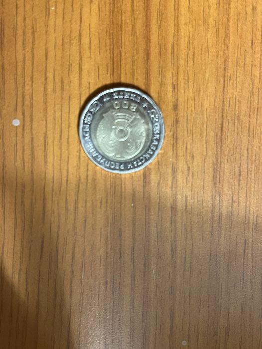 Монета 80 лет победы номиналом 200 тенге