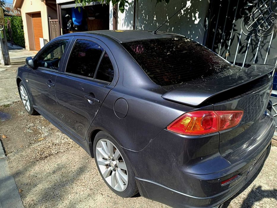 Mitsubishi Lancer 2009 - 1.5 Benzina + CADOU (extra set 4 jante aluminiu)