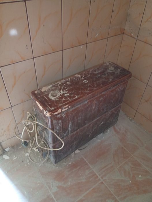 Soba  veche teracota și electrică