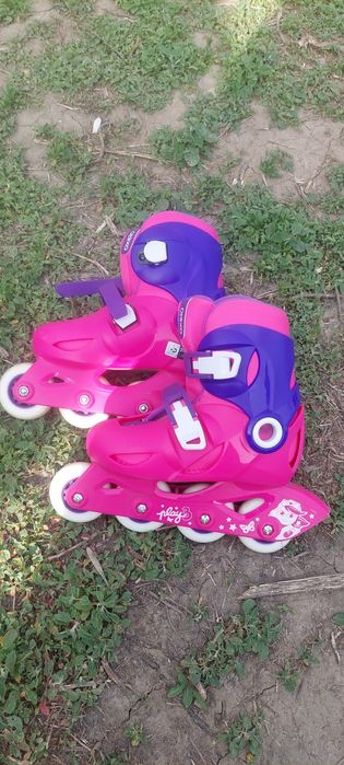 Роликовые коньки