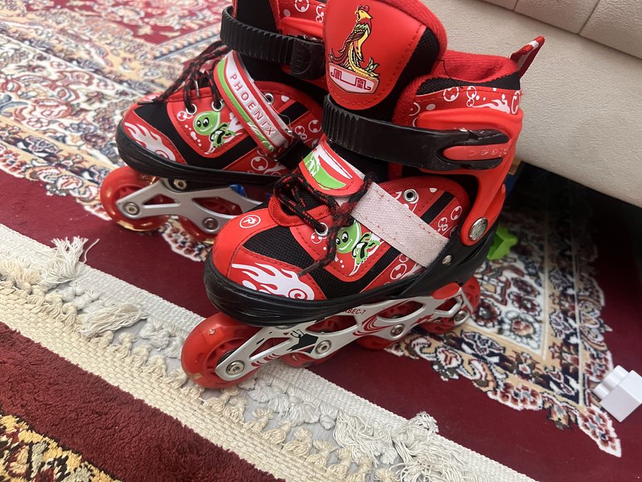 Роликовые коньки