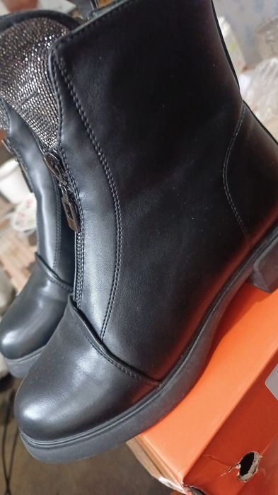 Продам новые сапоги