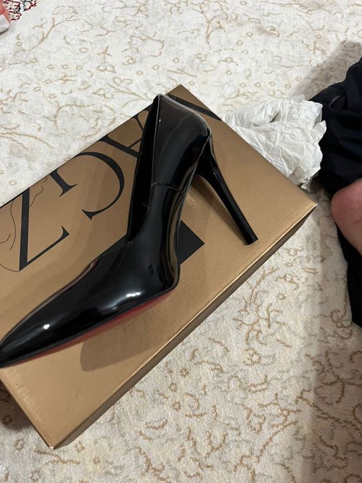 Туфли, бір рет киілген