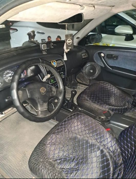 Ниссан примера машина