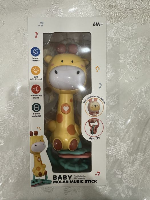Развивающая игрушка 6М+ с музыкой, прорезывателем для зубов