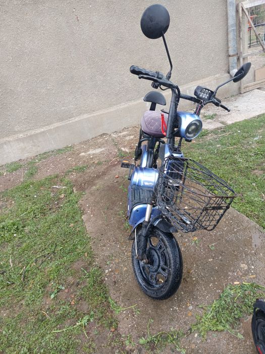 Scuter electric geeli