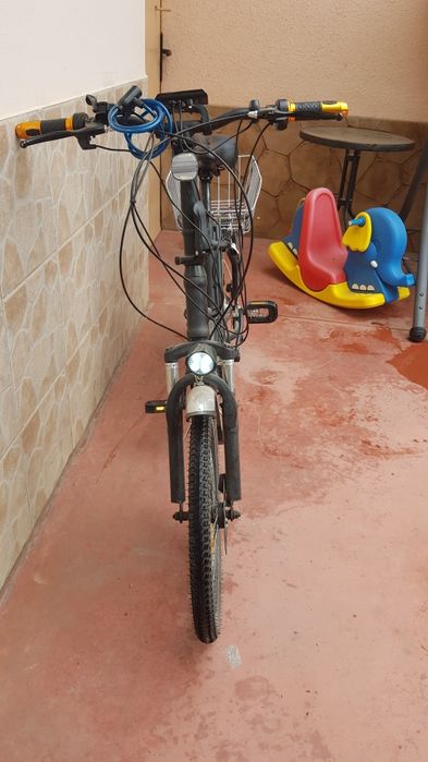 Bicicletă electrică Volta cu accelerație la mână