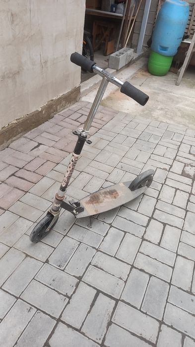 Самокат б/у, в хорошем состоянии