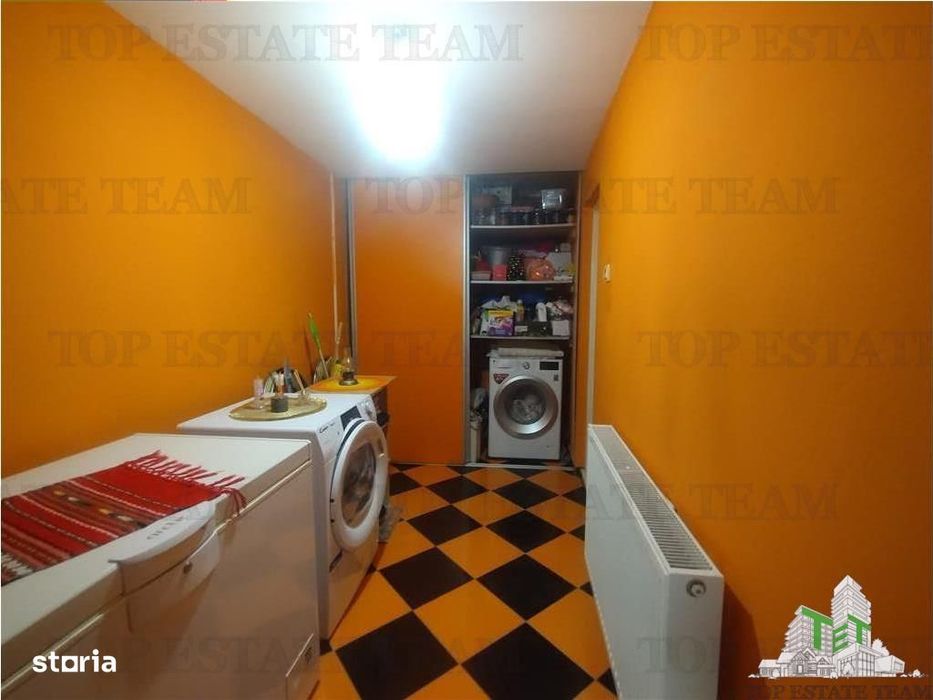 Teren generos 700 mp, include casa cu panouri fotovoltaice, langa Bucu