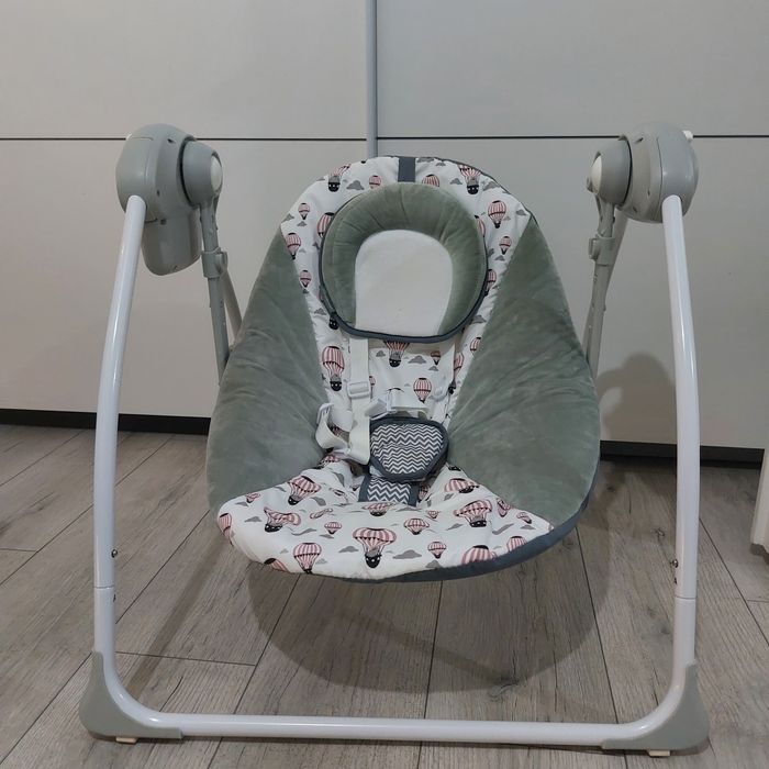 Leagan Kinderkraft Flo, cu melodii, roz cu gri