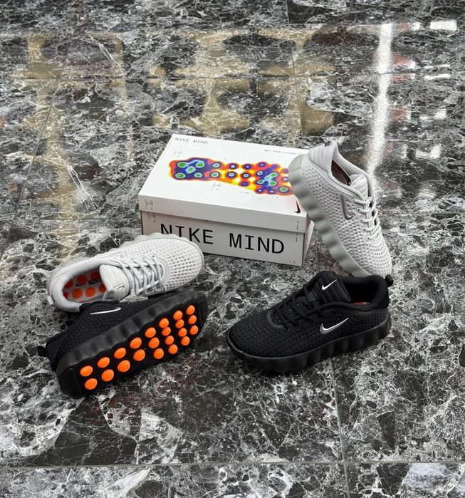 Adidasi nike mind 001
