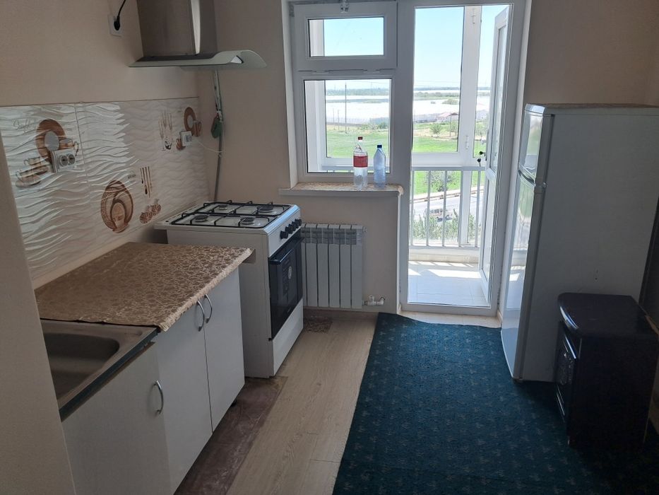 Адресс:Хива йулинда Броллейрда  йул устиндаги 9_этажли домда