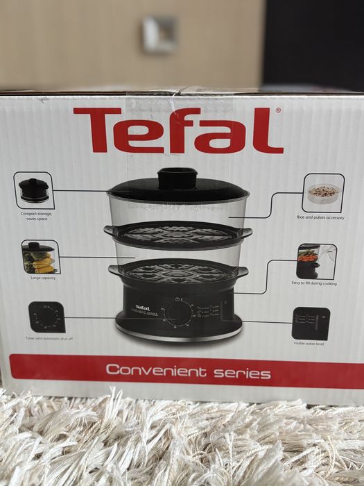 Este nou Aparat de gatit cu aburi Tefal VC1401, 900W, Timer, oprire automata, depozitare compacta, grile detasabile,
