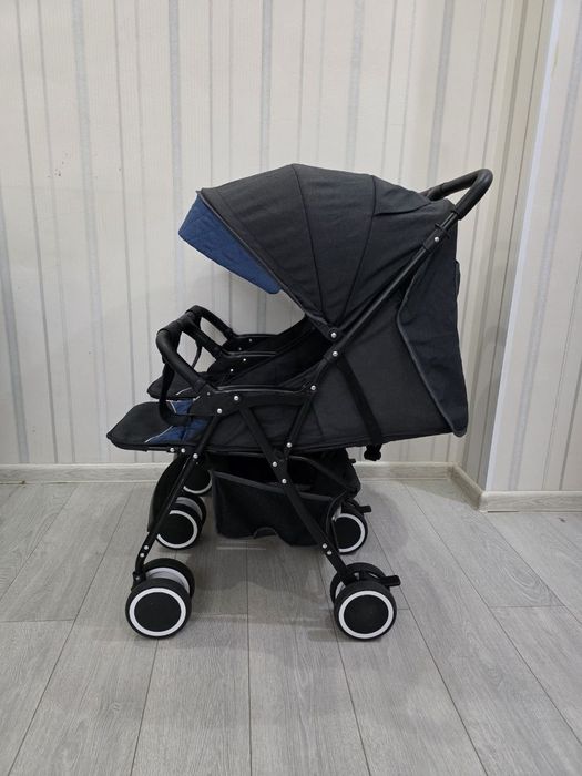 Детская коляска для двойни