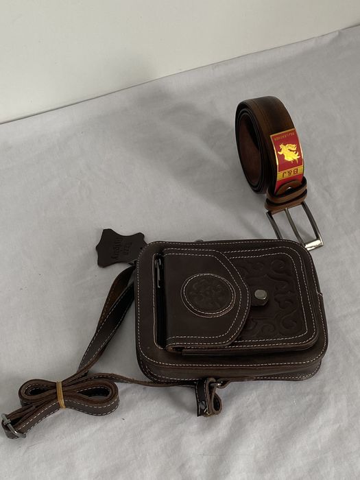 Барсетки с орнаментами из кожы