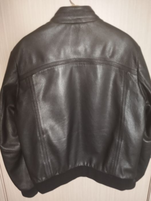 Новая кожаная куртка.