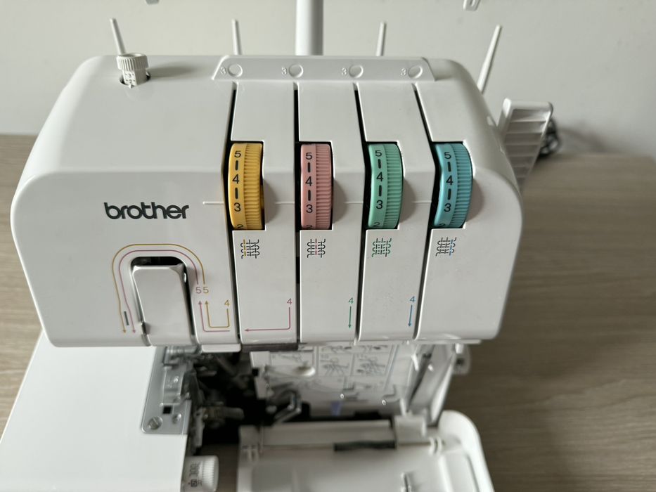 Vand masina de festonat Brother 1034DX