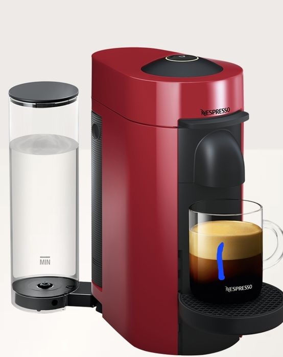 Aparat nespresso vertuo cu capsule.