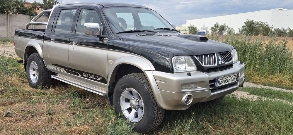 Mitsubishi L 200 climatronic 4x4 Diferitial blocabil la buton