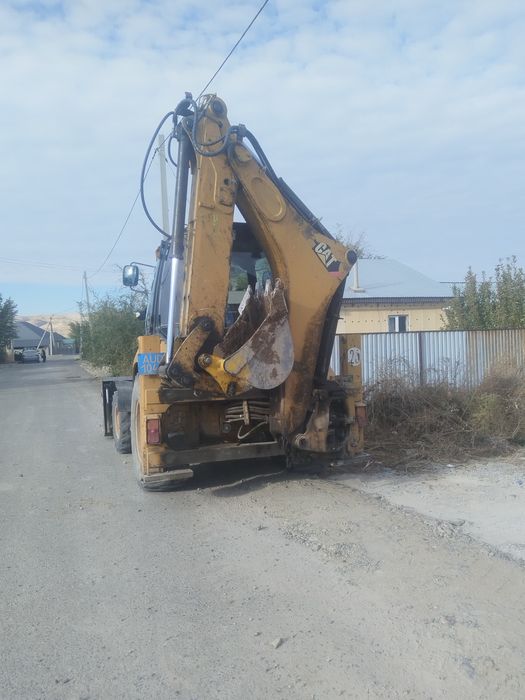 Продам экскаватор погрузчик 3/1 cat 432E