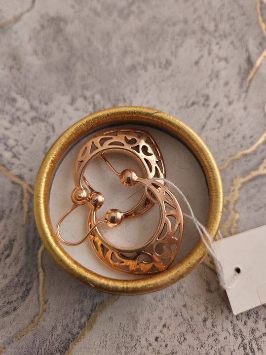 Продам золотые серьги