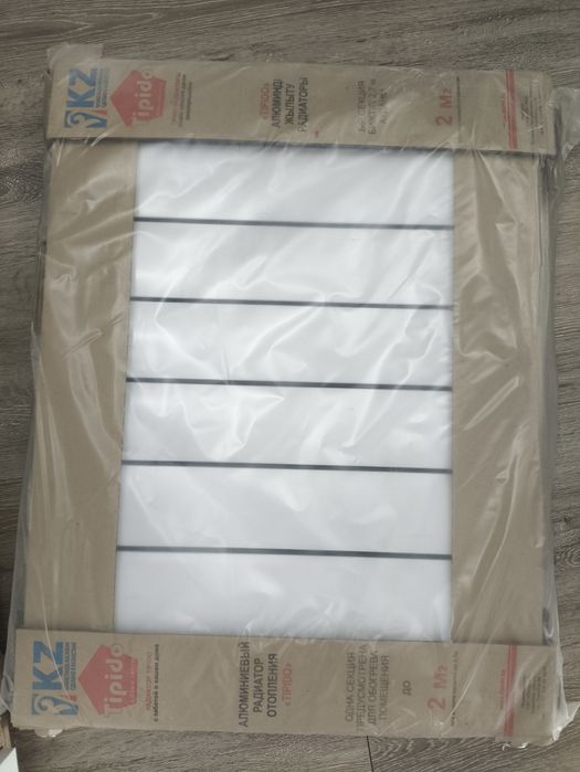 Новый радиатор алюминиевый