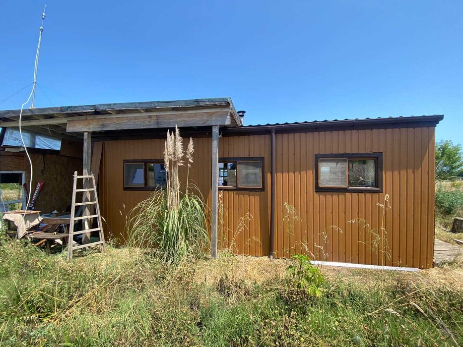 Облицовъчна трапецовидна пластифицирана ламарина с дървесна шарка